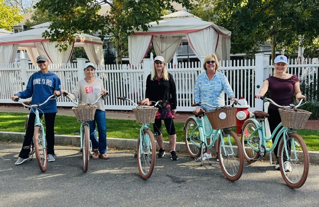 Women lined up on bikes