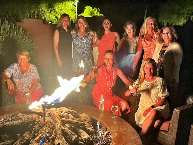Women around a firepit