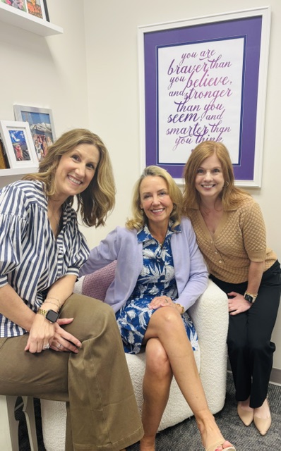 Talley, Jennifer and Stacey sitting in new office space